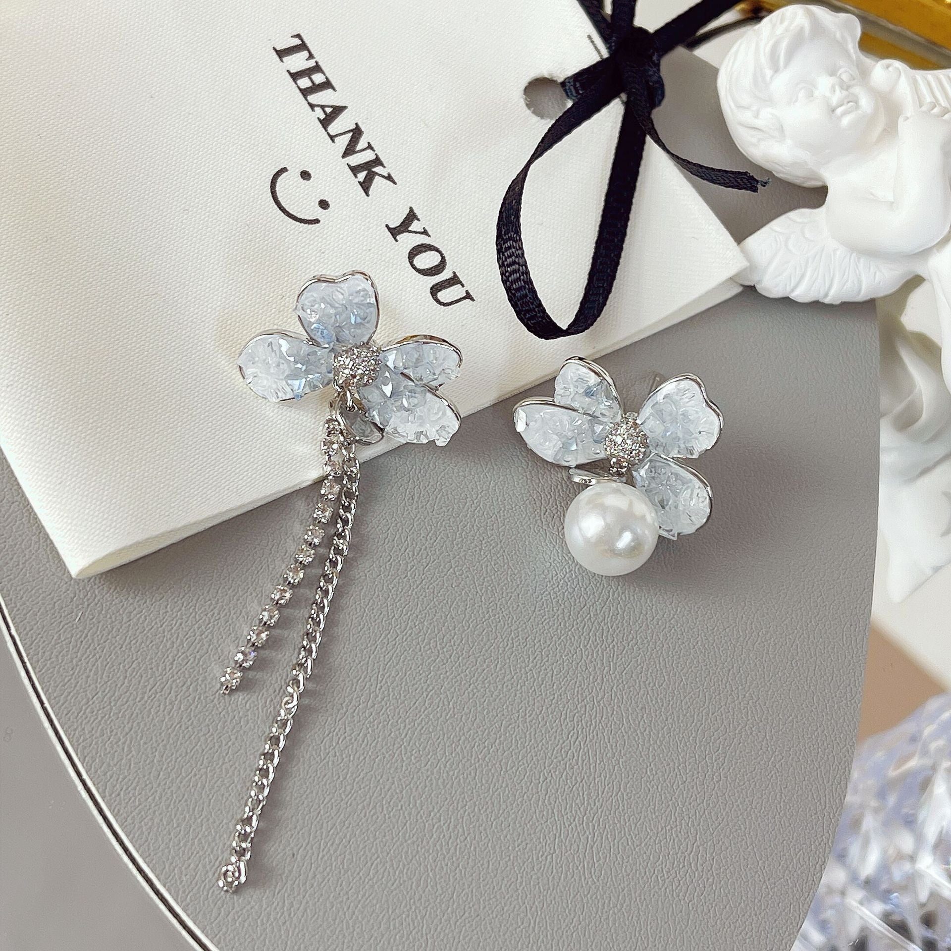 Asymmetrical blue crystal flower pearl tassel earrings